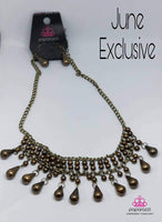 2018 June Fashion Fix Exclusive Threaded along metallic rods, stacked brass beads give way to shimmery brass teardrops. The edgy fringe flawlessly drapes beneath the collar, creating a sassy tapered fringe. Features an adjustable clasp closure. Sold as one individual necklace. Includes one pair of matching earrings.