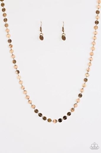 Brushed in an antiqued finish, flat brass discs link below the collar in an undeniably shimmery fashion. Features an adjustable clasp closure. Sold as one individual necklace. Includes one pair of matching earrings.  P2WH-BRXX-104LJ
