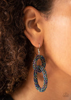 2021 Empower Me Pink Exclusive A dainty collection of iridescent oil spill seed beads adorns two interlocking hoops, creating a colorfully stacked lure. Earring attaches to a standard fishhook fitting. Sold as one pair of earrings.   P5ST-MTXX-035XX