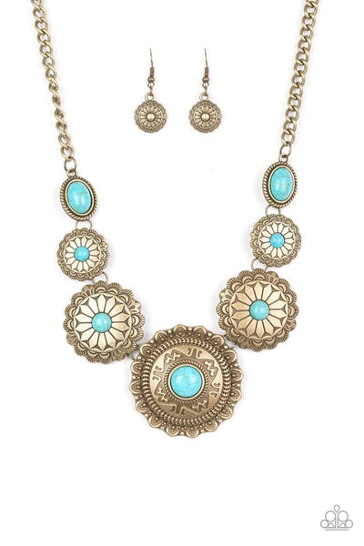 Radiating with tribal inspired textures, round brass frames link below the collar in a seasonal fashion. Refreshing turquoise stones are pressed into the ornate centers for a seasonal finish. Features an adjustable clasp closure. Sold as one individual necklace. Includes one pair of matching earrings.  **** Please note the necklace on hand is not shiny brass but more antiqued and darker brass ****  P2TR-BRBL-069XX