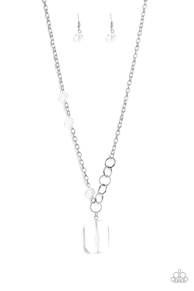 2020 January Life Of The Party Exclusive  A trio of glassy white crystal-like beads asymmetrically trickle along a mismatched silver chain. Featuring a regal emerald-cut, an over sized white gem swings from the bottom of the silver chain for a glamorous finish. Features an adjustable clasp closure. Sold as one individual necklace. Includes one pair of matching earrings.  P2SE-WTXX-187XX