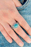 A refreshing turquoise stone is pressed into the center of a dainty silver band radiating with studded and filigree textures for a seasonal look. Features a dainty stretchy band for a flexible fit. Sold as one individual ring.