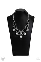 BLOCKBUSTER PIECE Joined by dainty silver links, two rows of dramatic silver chain layer below the collar in a fierce fashion. Glittery white teardrops drip from the glistening layers, adding a timeless shimmer to the show-stopping piece. Features an adjustable clasp closure. Sold as one individual necklace. Includes one pair of matching earrings.  P2RE-WTXX-178XX