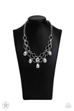 BLOCKBUSTER PIECE Joined by dainty silver links, two rows of dramatic silver chain layer below the collar in a fierce fashion. Glittery white teardrops drip from the glistening layers, adding a timeless shimmer to the show-stopping piece. Features an adjustable clasp closure. Sold as one individual necklace. Includes one pair of matching earrings.  P2RE-WTXX-178XX