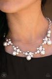 Blockbuster Clusters of pearls and dazzling white rhinestones join below the collar, creating refined frames. Infused with a glistening silver chain, the sections of luminescent frames trickle along the neck in a timeless fashion. Features an adjustable clasp closure. Sold as one individual necklace. Includes one pair of matching earrings.  P2RE-WTSV-143XX