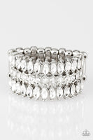 Featuring refined marquise cuts, glittery white rhinestones flare from a center of glassy white rhinestones, creating a regal band across the finger. Features a stretchy band for a flexible fit.  P4RE-WTXX-280XX