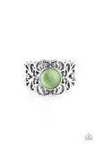 A glowing green moonstone adorns the center of a silver band swirling with whimsical floral detail for a seasonal look. Features a stretchy band for a flexible fit. Sold as one individual ring.  P4RE-GRXX-084XX