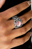 A glowing pink moonstone adorns the center of a silver band swirling with whimsical floral detail for a seasonal look. Features a stretchy band for a flexible fit.  P4RE-PKXX-131XX