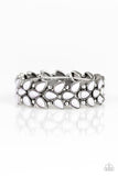 Faceted gray teardrop beads and shimmery silver studs coalesce into ornate frames. The whimsical frames are threaded along stretchy bands around the wrist for a seasonal look. Sold as one individual bracelet.  P9WH-SVXX-176XX