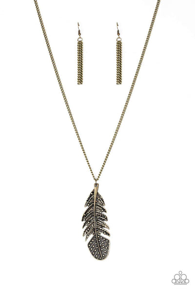 Featuring studded and antiqued textures, a dramatic brass feather pendant swings from the bottom of an elongated brass chain for a free-spirited fashion. Features an adjustable clasp closure. Sold as one individual necklace. Includes one pair of matching earrings.  P2SE-BRXX-089XX