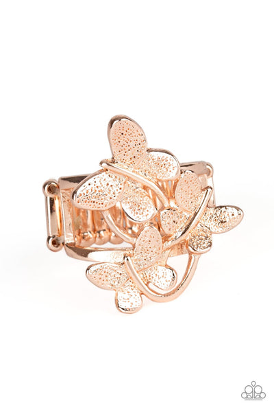 A trio of fluttering rose gold butterflies rest atop the finger, coalescing into a whimsical centerpiece. Features a stretchy band for a flexible fit. Sold as one individual ring. Featured inside The Preview at ONE Life! P4WH-GDRS-089XX