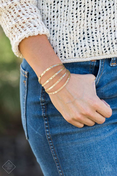 2018 November Fashion Fix Delicately hammered in shimmery textures, glistening gold bars arc across the wrist, coalescing into an airy cuff. Sold as one individual bracelet. P9BA-GDXX-035HK