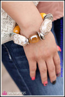 BLOCKBUSTER  Chunky peach beads combine with intricate silver details on a stretchy band. Matches Blockbuster Necklace. Sold as one individual bracelet.   Get The Complete Look! Necklace: "In Good Glazes - Peach" (Sold Separately)  P9RE-OGSV-010XX