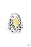 A glowing yellow cat's eye stone is pressed into the center of an oval backdrop swirling with vine-like filigree for a whimsical look. Features a stretchy band for a flexible fit. Sold as one individual ring.  P4WH-YWXX-116XX