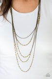 Brushed in a metallic shimmer, dainty aurum beads trickle along brass chains, creating shimmery layers across the chest. Featuring faceted edges, the glittery beads cascade down the sides of the palette for an additional hint of sparkle. Features an adjustable clasp closure. Sold as one individual necklace. Includes one pair of matching earrings.   P2RE-BRXX-110XX