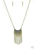 2018 October Fashion Fix Exclusive Radiating in linear textures, a glistening brass crescent swings from the bottom of a lengthened brass chain. Shimmery brass chains and flared brass beading swings from the bottom of the tribal inspired pendant, creating a flirtatious fringe. Features an adjustable clasp closure. Sold as one individual necklace. Includes one pair of matching earrings.  P2TR-BRXX-097XX