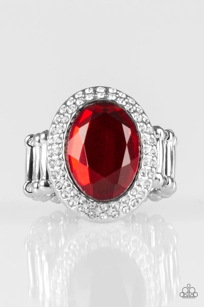 A glittery red gem is pressed into the center of a classic silver frame radiating with sparkling white rhinestones. Features a stretchy band for a flexible fit. Sold as one individual ring. P4RE-RDXX-069XX