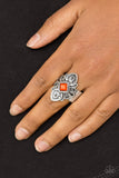 An orange square bead is pressed into the center of a scalloped silver frame radiating with tribal inspired detail for a seasonal look. Features a stretchy band for a flexible fit. Sold as one individual ring.  P4WH-OGXX-097XX