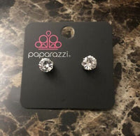 BLOCKBUSTER A sparkling white rhinestone is nestled inside a classic silver frame for a timeless look. Earring attaches to a standard post fitting. Sold as one pair of post earrings.   P5PO-WTXX-076XX