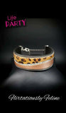 2019 October Life Of The Party Infused with strands of antiqued silver chains and glassy white rhinestones, wavy pieces of tan leather and cheetah print line the front of a black suede band for a fierce look. Features an adjustable clasp closure. Sold as one individual bracelet.  P9DI-URBN-092XX