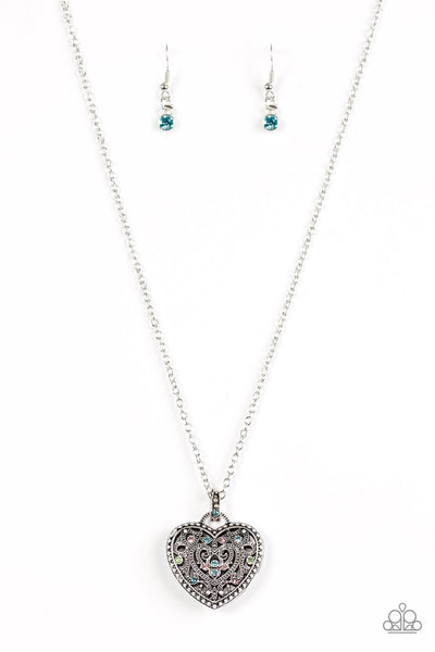 Encrusted in glittery colorful rhinestones, a vintage inspired heart pendant swings from the bottom of a shimmery silver chain for a romantic fashion. Features an adjustable clasp closure. Sold as one individual necklace. Includes one pair of matching earrings.  P2WH-MTXX-175XX