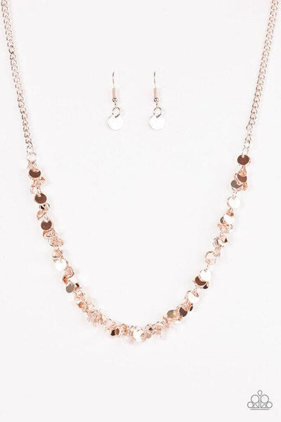 Dainty shiny rose gold discs trickle below the collar, creating a flirty fringe. The flat shiny discs catch and reflect the light, creating playful movement across the chest. Features an adjustable clasp closure. Sold as one individual necklace. Includes one pair of matching earrings.  P2RE-GDRS-175XX