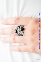 Featuring various cuts and shimmer, glittery black and white rhinestones are sprinkled across an airy frame, creating glamorous sparkle. Features a stretchy band for a flexible fit. Sold as one individual ring. P4RE-BKXX-130XX