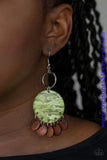 Brown wooden discs dangle from the bottom of a green acrylic frame that attaches to a shimmery silver ring, creating a beach inspired look. Earring attaches to a standard fishhook fitting. Sold as one pair of earrings.  P5SE-GRXX-081XX