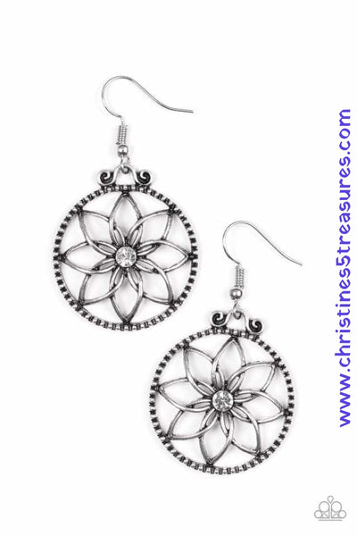 Brushed in an antiqued shimmer, glistening silver bars bend into airy petals. A glittery white rhinestone dots the floral center for a feminine finish. Earring attaches to a standard fishhook fitting. Sold as one pair of earrings. P5WH-WTXX-123XX