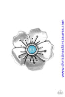 A bright blue bead is pressed into the center of a blooming silver flower radiating with antiqued details for a whimsical look. Features a stretchy band for a flexible fit. Sold as one individual ring.  P4WH-BLXX-146XX