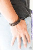Brown suede laces are threaded along the front a leather band for a rugged look. Features an adjustable snap closure. Sold as one individual bracelet. P9UR-BNXX-376XX