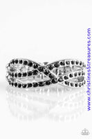 Encrusted in glittery black rhinestones, shimmery ribbons of silver crisscross across the finger in a timeless fashion. Features a dainty stretchy band for a flexible fit. Sold as one individual ring.  P4DA-BKXX-058XX