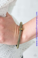 Shimmery brass mesh chain joins into a thick bangle around the wrist. Encrusted in glittery aurum rhinestones, a brass ring slides along the bangle, adding sassy sparkle to the edgy palette. Sold as one individual bracelet. P9RE-BRXX-065XX