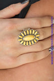 Sunny yellow stones are pressed into a studded silver frame, coalescing into a whimsical floral centerpiece atop the finger. Features a stretchy band for a flexible fit. Sold as one individual ring.  P4SE-YWXX-053XX