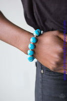 Infused with metallic accents, refreshing blue beads are threaded along a stretchy band around the wrist for a colorful pop of color. Sold as one individual bracelet. Get The Complete Look!  Necklace: "Everyday Eye Candy - Blue" (Sold Separately) P9WH-BLXX-190NO