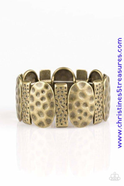 Delicately hammered in antiqued detail, round and rectangular shaped frames are threaded along stretchy bands, creating a bold tribal look around the wrist. Sold as one individual bracelet.  P9TR-BRXX-061XX