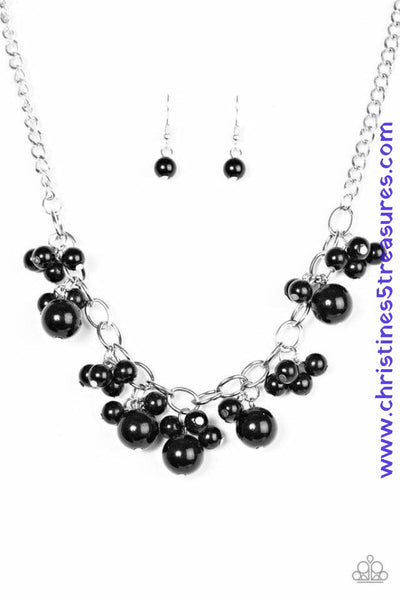 Clusters of large and small black beads cascade from the bottom of a bold silver chain, creating a refined fringe below the collar. Features an adjustable clasp closure. Sold as one individual necklace. Includes one pair of matching earrings.  P2RE-BKXX-181XX