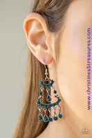 Dotted in dainty blue rhinestones, stacked silver frames give way to a teardrop fringe encrusted in glassy blue rhinestones, creating a refined chandelier. Earring attaches to a standard fishhook fitting. Sold as one pair of earrings.  P5RE-BLXX-177XX