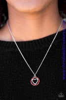Encrusted in fiery red rhinestones, a shimmery silver heart pendant swings below the collar in a whimsical fashion. Features an adjustable clasp closure. Sold as one individual necklace. Includes one pair of matching earrings.  P2RE-RDXX-084XX