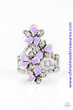 Featuring shiny purple and textured silver petals, colorful flowers dance across the finger, coalescing into a whimsical frame atop the finger. Features a stretchy band for a flexible fit. Sold as one individual Paparazzi ring. P4WH-PRXX-158XX