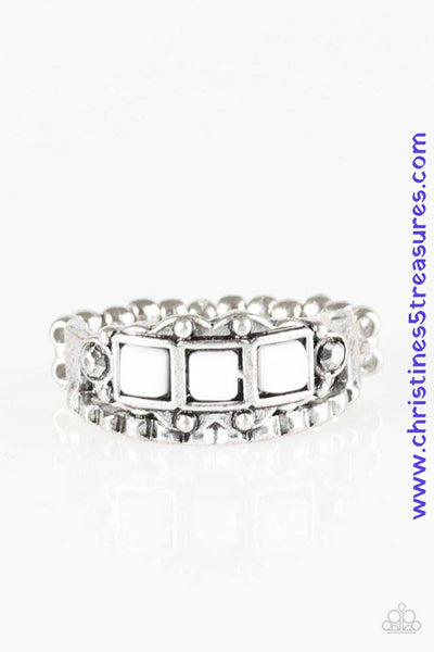 Featuring a square cut, white beads are pressed into a dainty silver band radiating with tribal inspired textures. Features a dainty stretchy band for a flexible fit. P4DA-WTXX-031XX