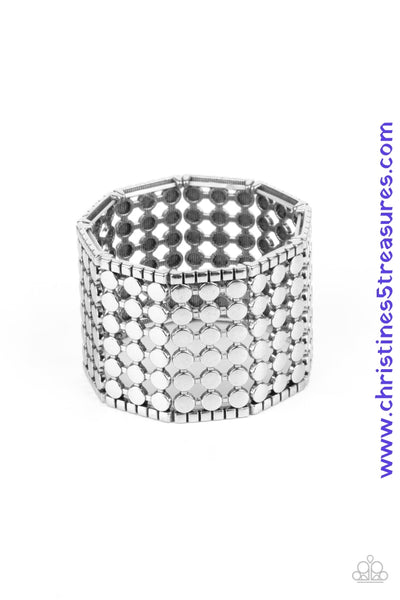 Bordered by rows of silver cubes, stacked rows of antiqued silver dots connect into rectangular frames that are threaded along stretchy bands around the wrist for an edgy geometric finish. Sold as one individual bracelet. P9ST-SVXX-019XX   
