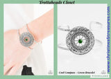 A glittery green rhinestone is pressed into an ornate silver frame, creating a whimsical cuff. Sold as one individual bracelet.  P9WH-GRXX-116QP