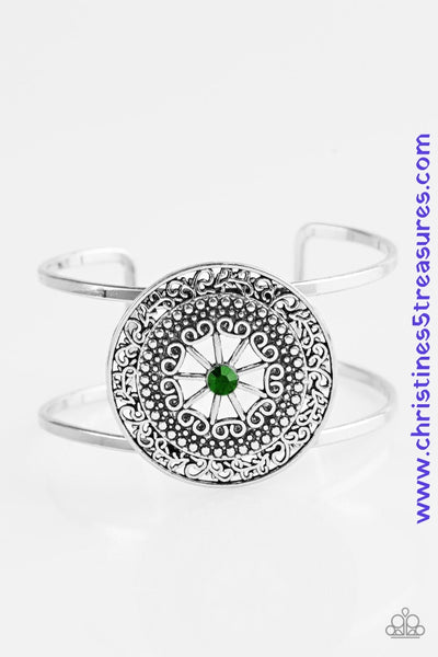 A glittery green rhinestone is pressed into an ornate silver frame, creating a whimsical cuff. Sold as one individual bracelet.  P9WH-GRXX-116QP