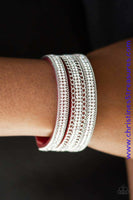 Rows of shimmery silver chains and glassy white rhinestones are encrusted along a red suede band. The glittery band has been spliced into three strands, creating row after row of blinding shimmer for a sassy look. Features an adjustable snap closure. Sold as one individual bracelet.  P9DI-URRD-031XX