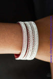Rows of shimmery silver chains and glassy white rhinestones are encrusted along a red suede band. The glittery band has been spliced into three strands, creating row after row of blinding shimmer for a sassy look. Features an adjustable snap closure. Sold as one individual bracelet.  P9DI-URRD-031XX