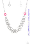 Two oversized pink pearls give way to dramatic silver chains, creating bold layers below the collar for a sassy look. Features an adjustable clasp closure. Sold as one individual necklace. Includes one pair of matching earrings.   P2IN-PKXX-040XX