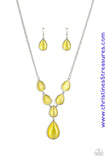 A series of yellow cat's eye teardrops interlock at the bottom of a silver chain, giving way to an oversized teardrop pendant for a refined finish. Features an adjustable clasp closure. Sold as one individual necklace. Includes one pair of matching earrings.  P2RE-YWXX-072XX