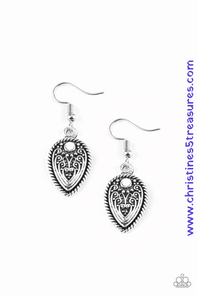 Embossed in whimsical antiqued textures, a shimmery silver teardrop frame swings from the ear. A dainty white bead is pressed into the top of the frame for a colorful finish. Earring attaches to a standard fishhook fitting. Sold as one pair of earrings.  P5DA-WTXX-059XX