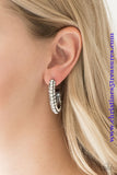 As if rolled in glitter, a shimmery gunmetal hoop is encrusted in row after row of sparkling white rhinestones for a show-stopping look. Earring attaches to a standard post fitting. Hoop measures 1" in diameter. Sold as one pair of hoop earrings.  P5HO-BKXX-115XX